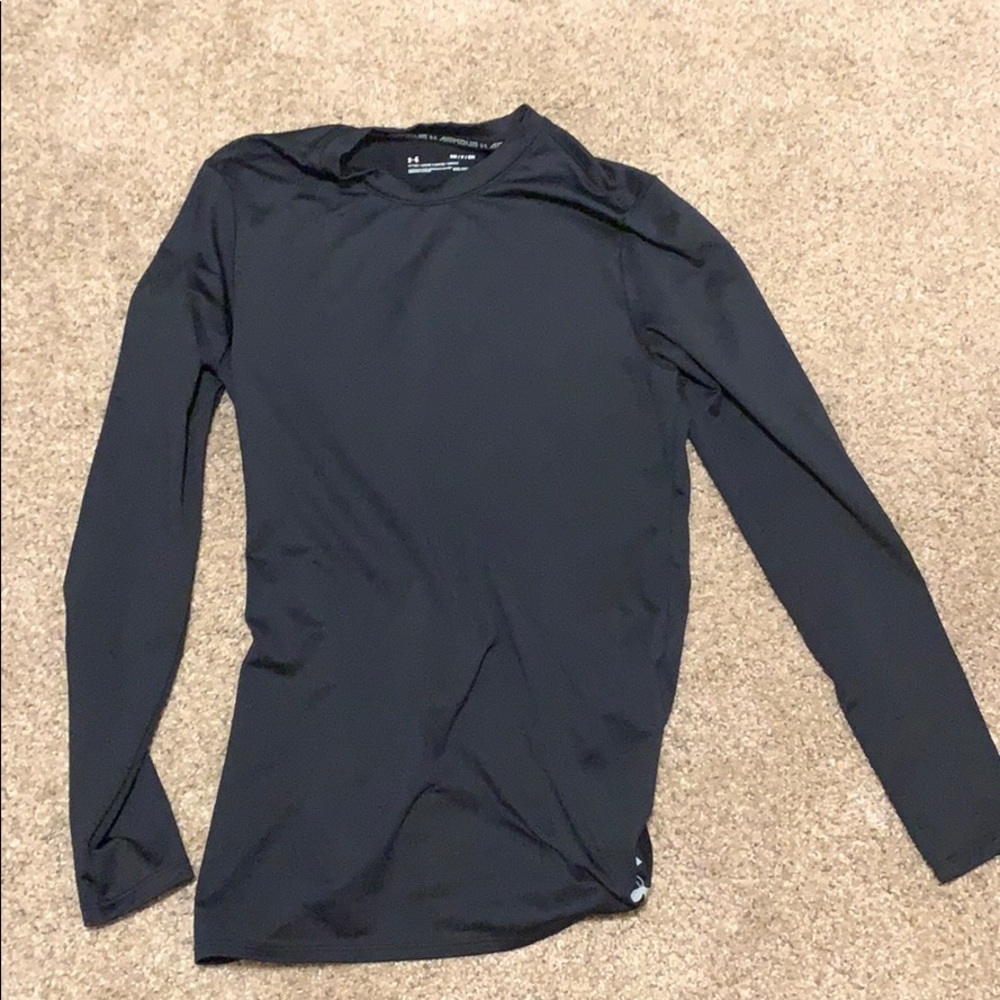 It’s an Under Armour black compression shirt